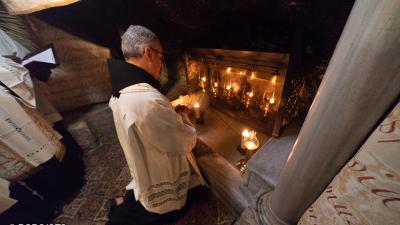 The Minister General of the Franciscan Friars Minor Fr. Massimo Fusarelli praying in the Nativity Grotto